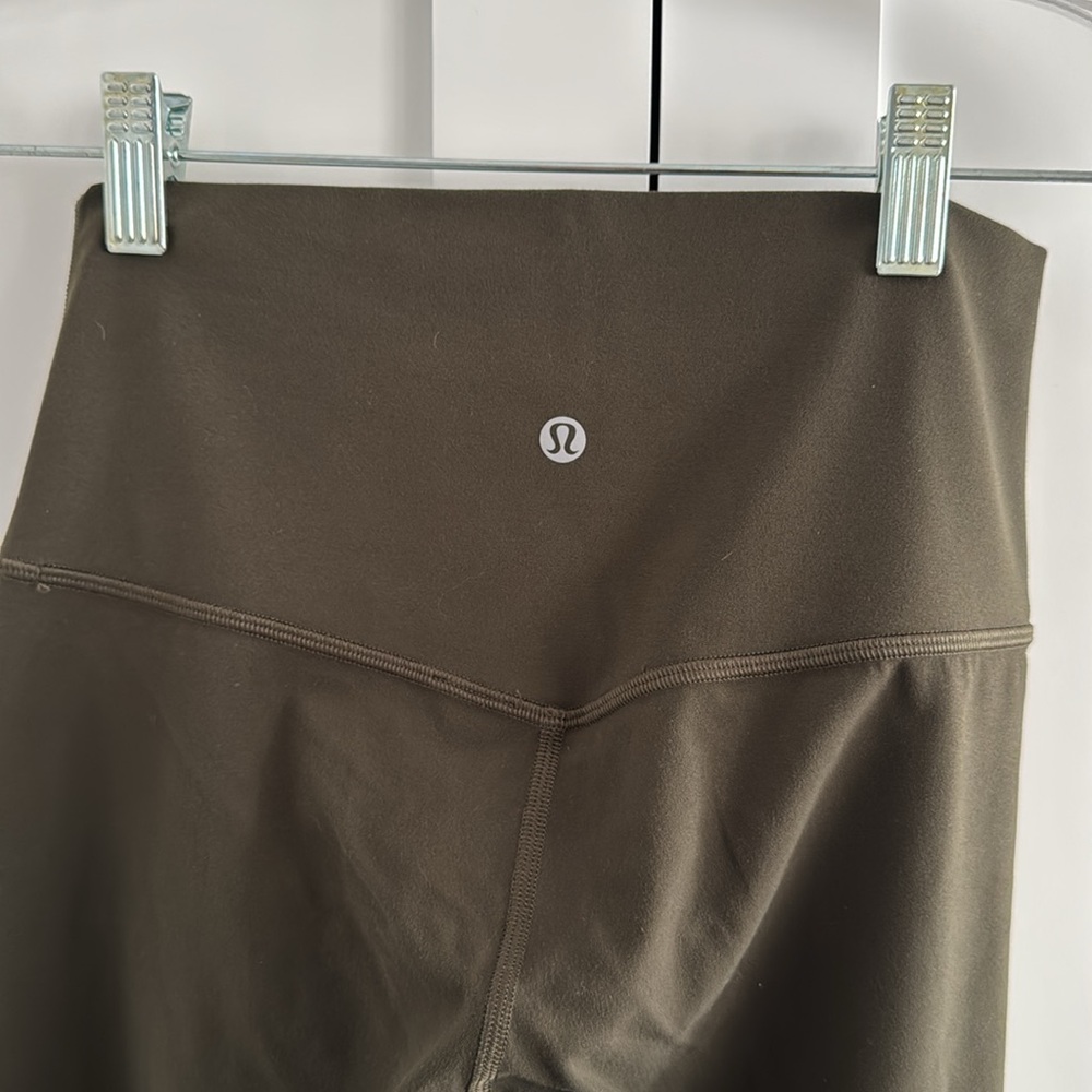 - LuluLemon High-Rise Tight 24”
New no tags in olive green 6